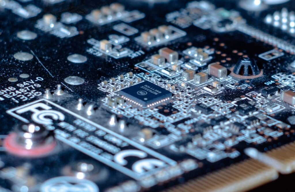 Detailed close-up of a computer circuit board showcasing components and intricate connections.